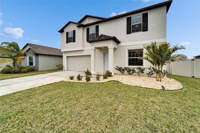 view of front facade featuring a garage, fence, driveway, stucco siding, and a front yard