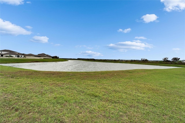 view of yard with a water view