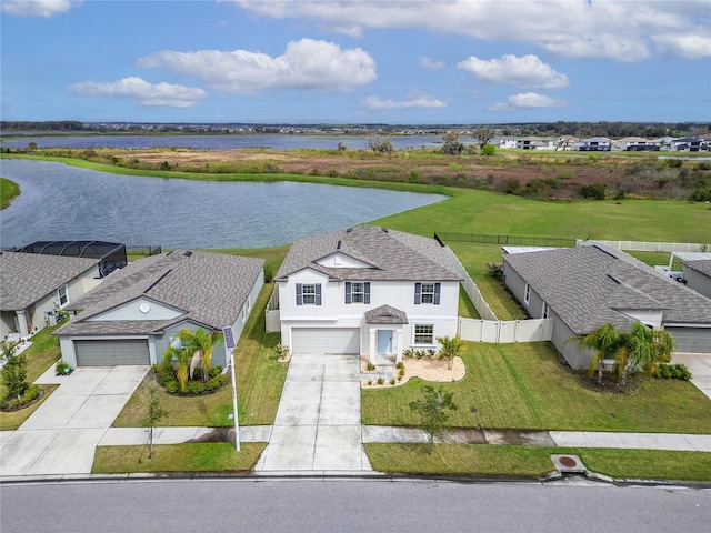 aerial view with a residential view and a water view