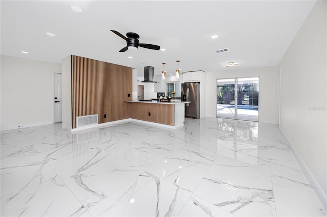 living room with marble finish floor, visible vents, and recessed lighting