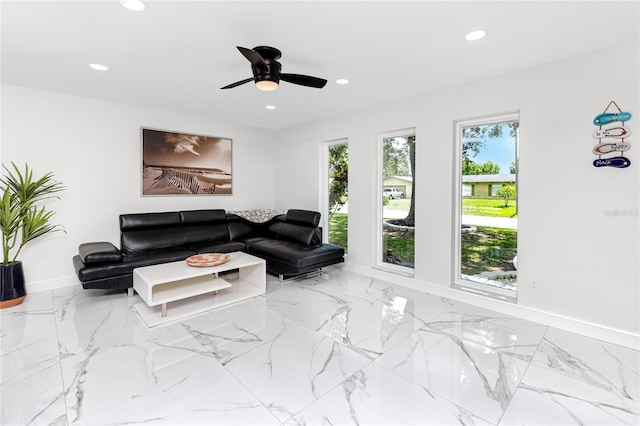 1100 Webb Dr, Clearwater, FL 33755 - living room featuring recessed lighting, marble finish flooring, and a ceiling fan