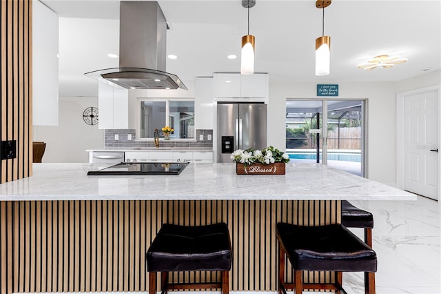 1100 Webb Dr, Clearwater, FL 33755 - kitchen with stainless steel appliances, island exhaust hood, modern cabinets, white cabinets, and marble tiled floors