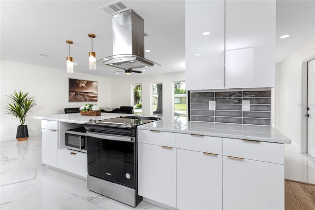 1100 Webb Dr, Clearwater, FL 33755 - kitchen featuring stainless steel appliances, modern cabinets, island exhaust hood, light stone countertops, and recessed lighting