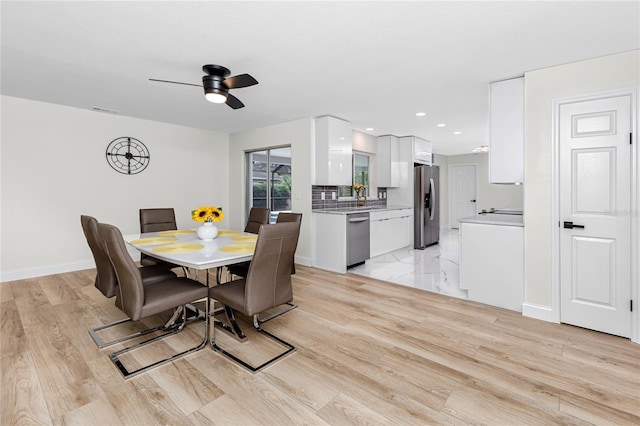 1100 Webb Dr, Clearwater, FL 33755 - dining area with a ceiling fan, light wood-style floors, and recessed lighting