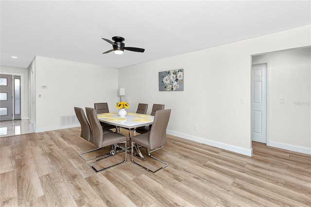 1100 Webb Dr, Clearwater, FL 33755 - dining space with light wood finished floors, a ceiling fan, and recessed lighting
