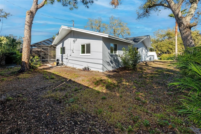 1100 Webb Dr, Clearwater, FL 33755 - view of home's exterior with glass enclosure
