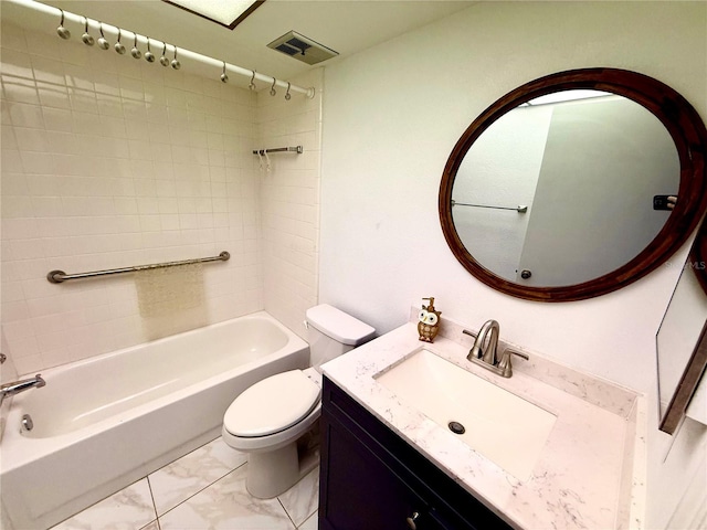 bathroom featuring visible vents, toilet, marble finish floor, vanity, and washtub / shower combination