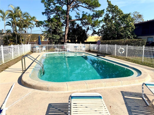 community pool with fence