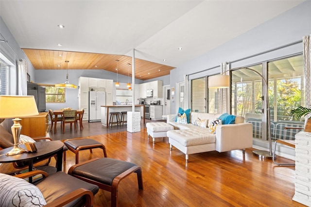 living room featuring lofted ceiling, wood finished floors, wood ceiling, and recessed lighting