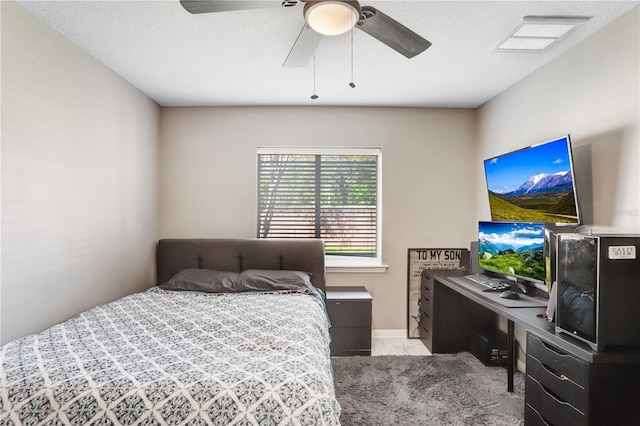 bedroom featuring a ceiling fan and visible vents