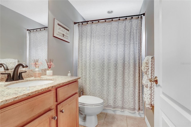 bathroom featuring vanity, tile patterned flooring, toilet, and a shower with curtain