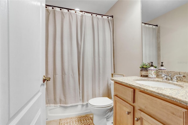 bathroom with toilet, tile patterned flooring, vanity, and shower / tub combo with curtain