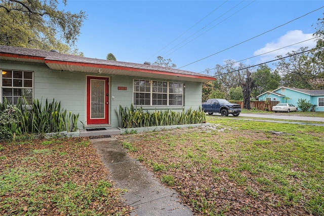 view of front of home with a front lawn