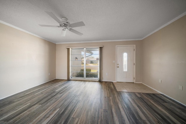 entryway featuring crown molding, a textured ceiling, and wood finished floors