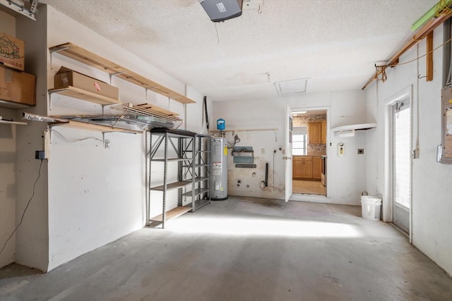 garage featuring a garage door opener and water heater