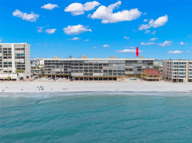 property view of water featuring a beach view and a city view