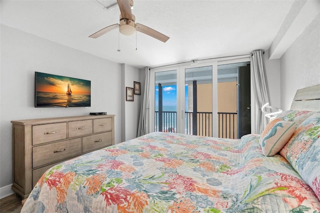 bedroom with access to outside, ceiling fan, baseboards, and wood finished floors