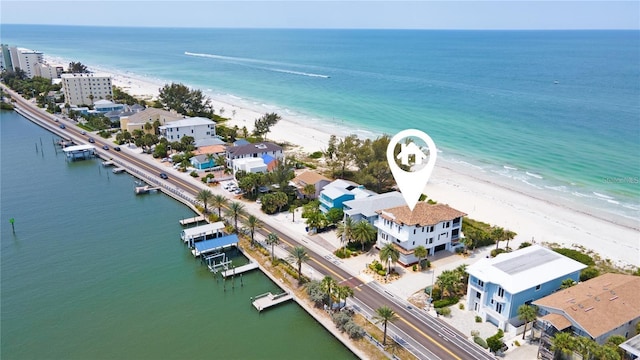 bird's eye view with a water view and a view of the beach