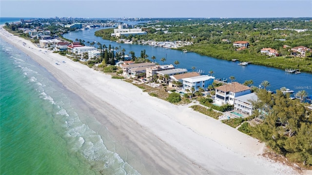 aerial view featuring a view of the beach and a water view