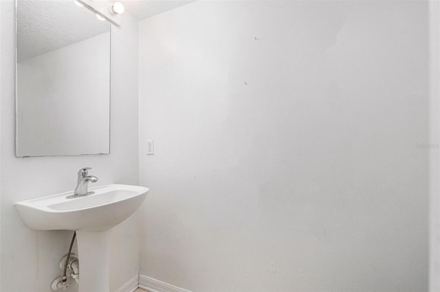 bathroom with baseboards