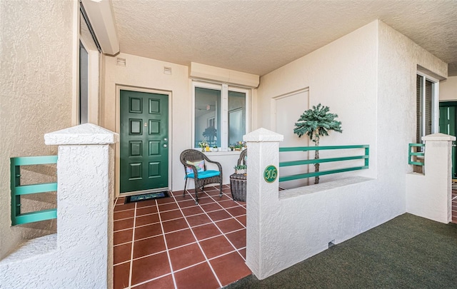 doorway to property with stucco siding