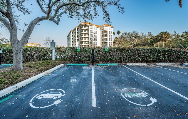 uncovered parking lot with fence