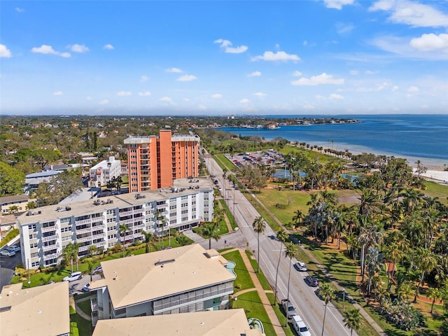 aerial view featuring a water view and a city view