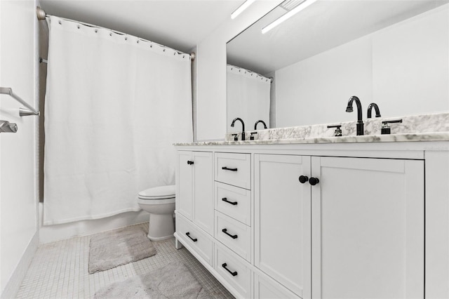 bathroom with double vanity, shower / tub combo, tile patterned flooring, and toilet