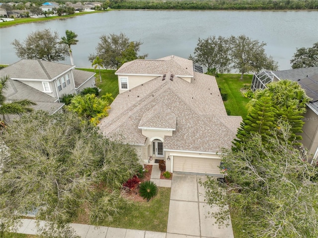 bird's eye view with a water view