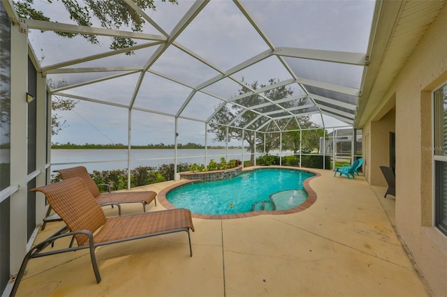 pool featuring a water view, glass enclosure, and a patio