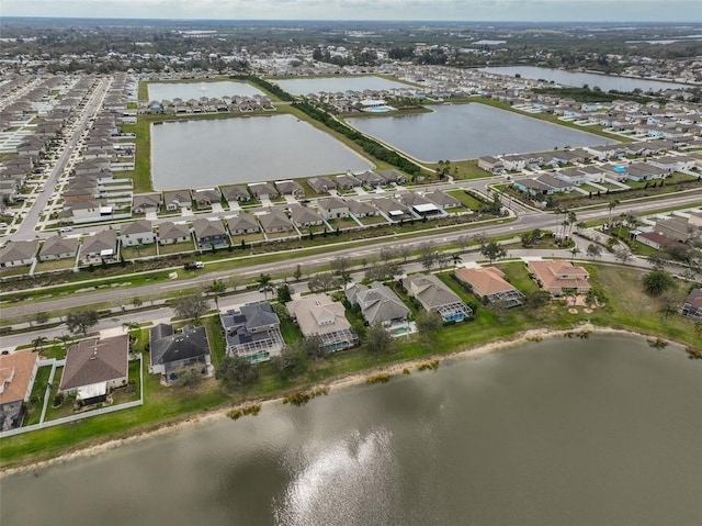 aerial view with a residential view and a water view