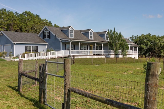 cape cod house with fence and a front yard