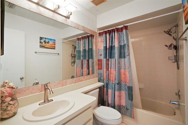 bathroom with shower / bath combo, visible vents, vanity, and toilet