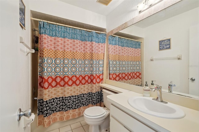 full bathroom with visible vents, a shower with shower curtain, toilet, vanity, and tile patterned flooring