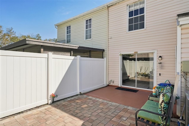 back of house with a patio area and fence