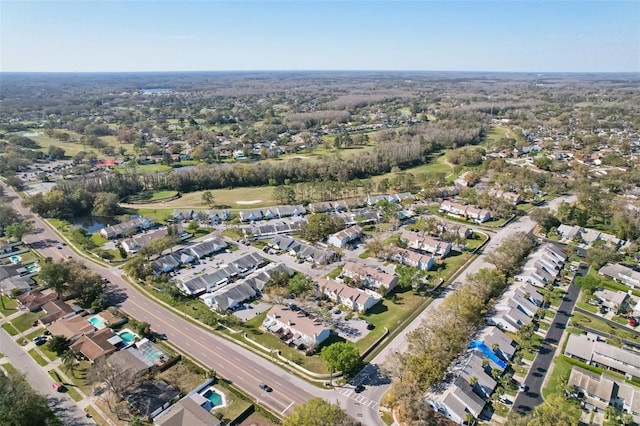 birds eye view of property with a residential view