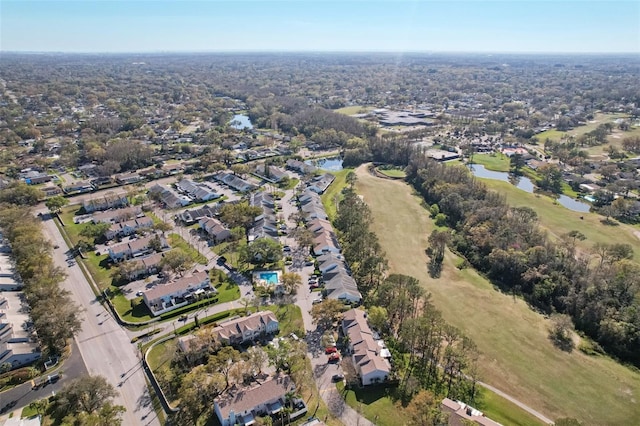 aerial view featuring a water view and a residential view