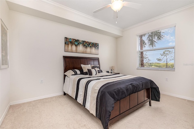 bedroom featuring a ceiling fan, light colored carpet, crown molding, and baseboards