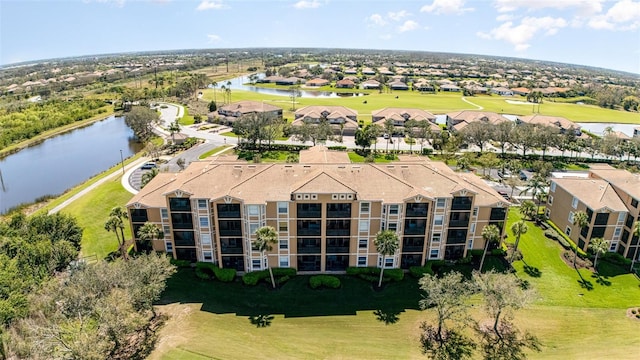 aerial view with a water view and a residential view