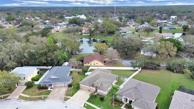 aerial view featuring a residential view and a water view