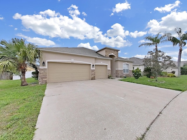 view of front of home featuring an attached garage, stone siding, a front lawn, and stucco siding