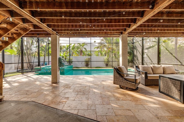 view of swimming pool with a fenced in pool, a fenced backyard, an outdoor hangout area, a lanai, and a patio area