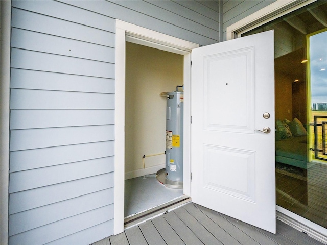 view of exterior entry with water heater