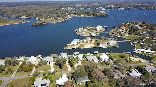 aerial view featuring a water view and a residential view