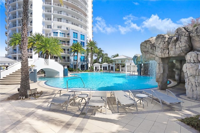 pool with a patio