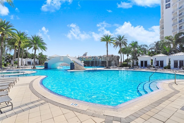 community pool featuring a patio area