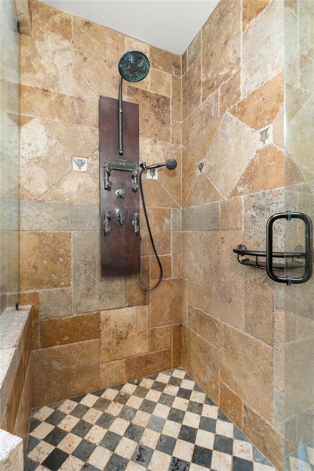 full bath featuring tiled shower