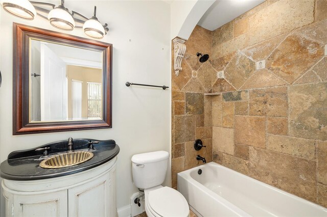 full bath with shower / bath combination, vanity, and toilet