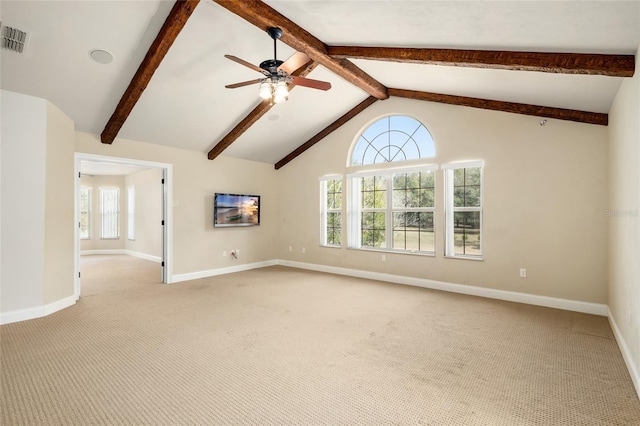 unfurnished room featuring light colored carpet, visible vents, and vaulted ceiling with beams