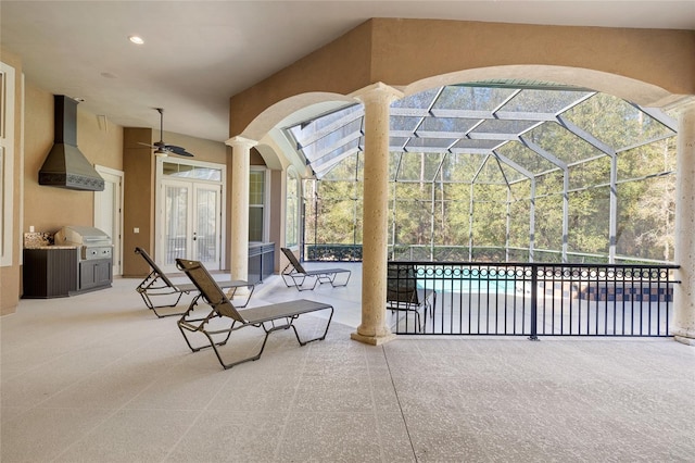 view of patio / terrace featuring an outdoor pool, glass enclosure, ceiling fan, a grill, and french doors